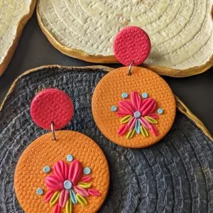 Perfect for mehndi occasion and eid, these unique Tassel Drop Earrings in Pink and Yellow are embellished with flower petals.