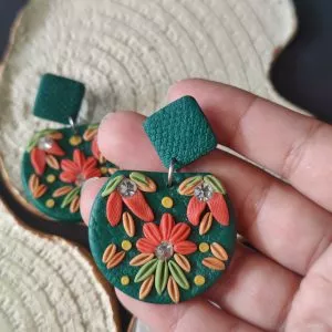 Handmade and lightweight, these Polymer Clay Earrings have Diamond top and Green base with Embellished.