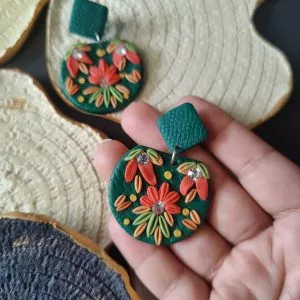 Handmade and lightweight, these Polymer Clay Earrings have Diamond top and Green base with Embellished.