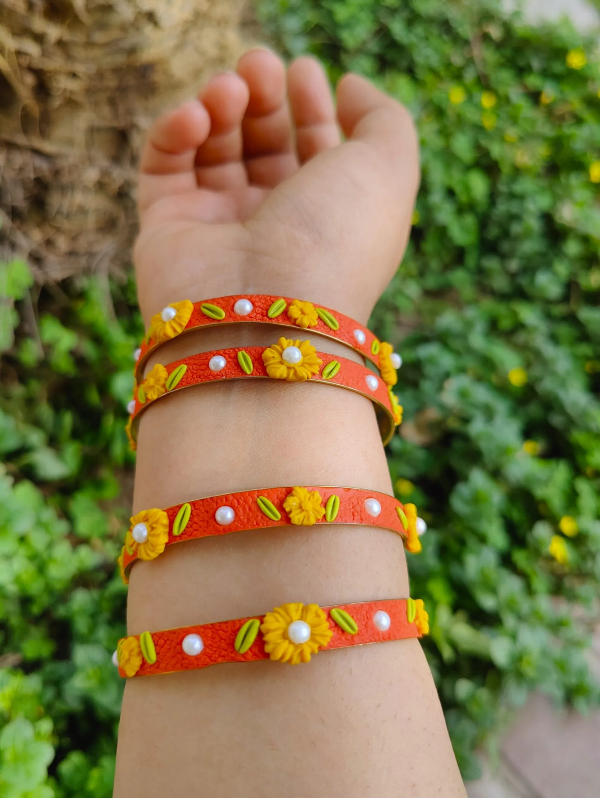 orange and yellow daisy bangles