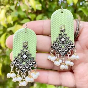 Handmade ethnic fusion statement earrings in peach and antique silver finish for festival fashion.