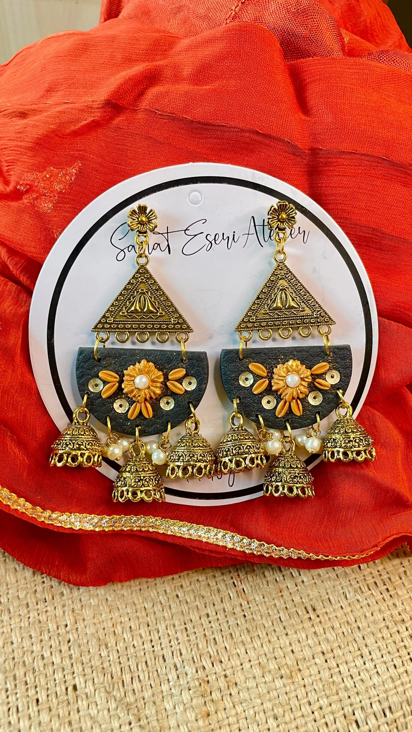 Trendy Ethnic Triple Jhumka Earrings in Black and Orange