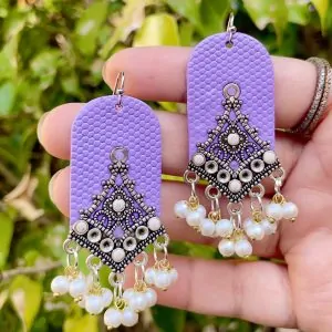 Bohemian purple textured earrings with oxidized silver charms and white pearls.