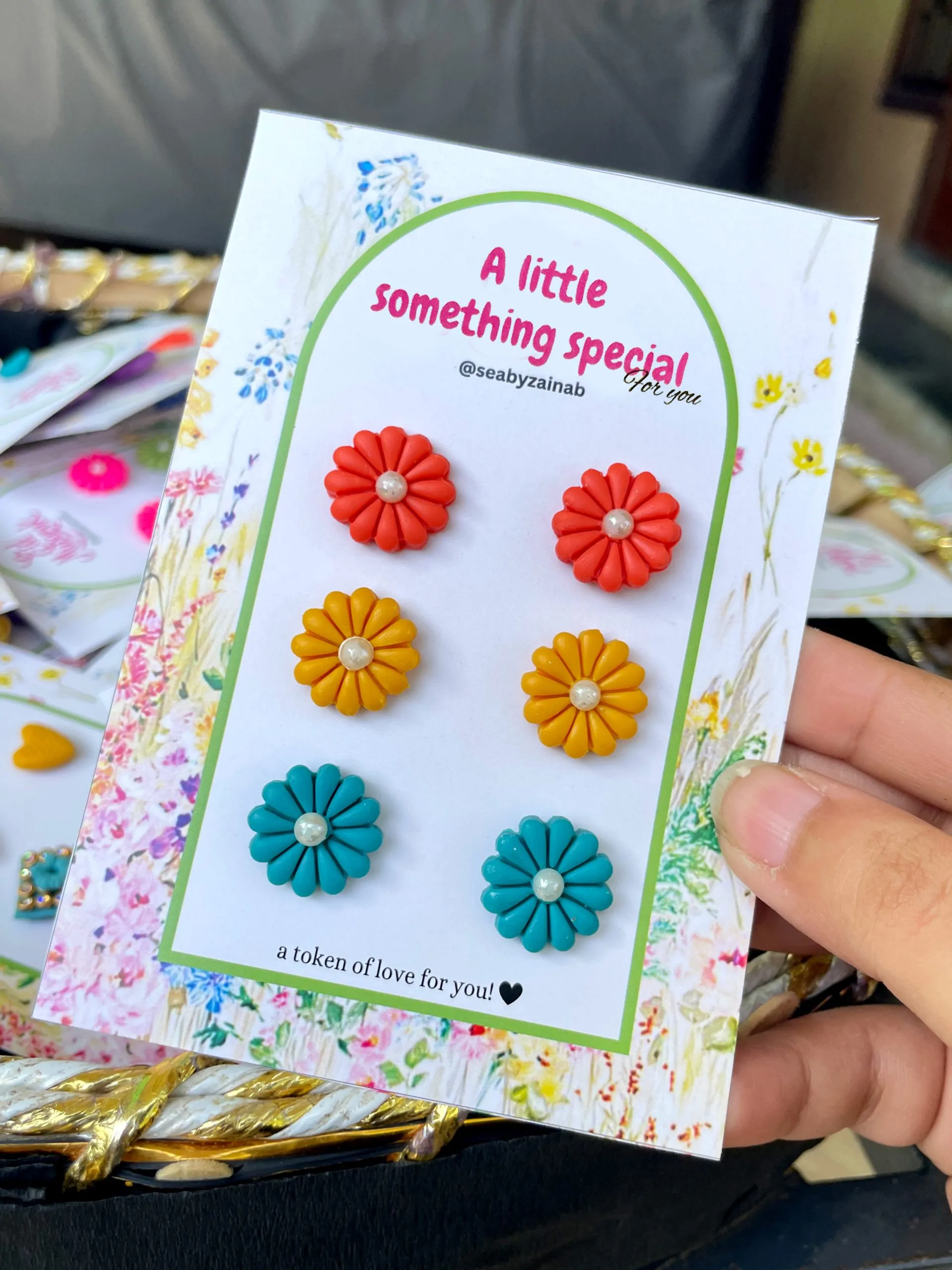 orange, yellow, and teal floral stud earring trio gift set.