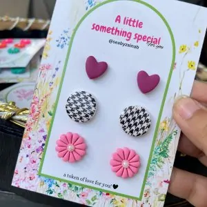plum heart, houndstooth pattern stud and soft pin flower stud