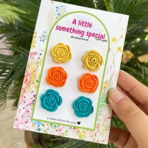 yellow, orange, ferozi teal rose