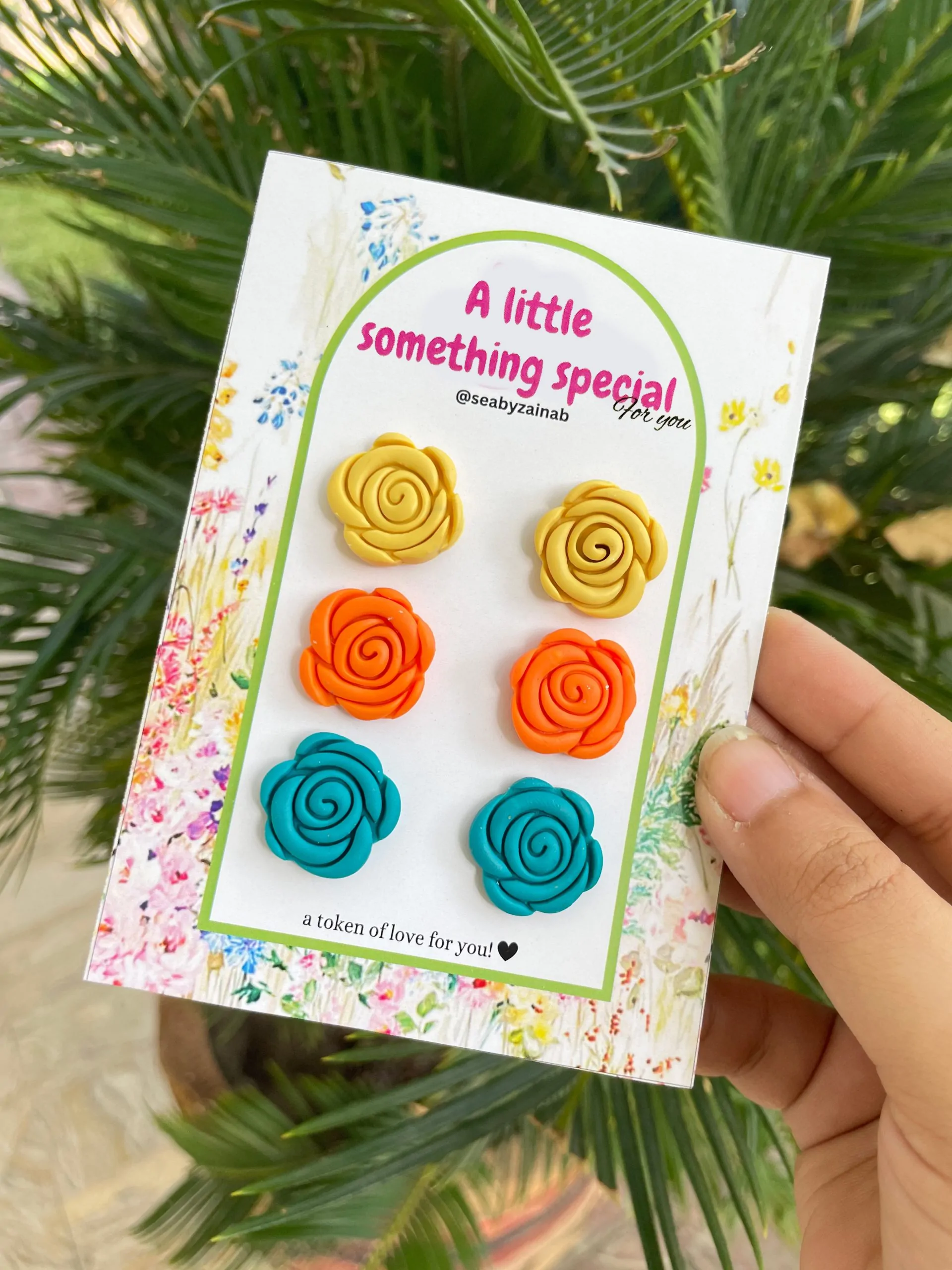 yellow, orange, ferozi teal rose