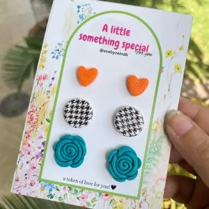 yellow heart, houndstooth pattern, teal rose flower stud