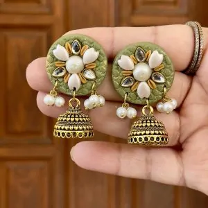 Olive green circular textured earrings with gold floral work and Jhumka bells.