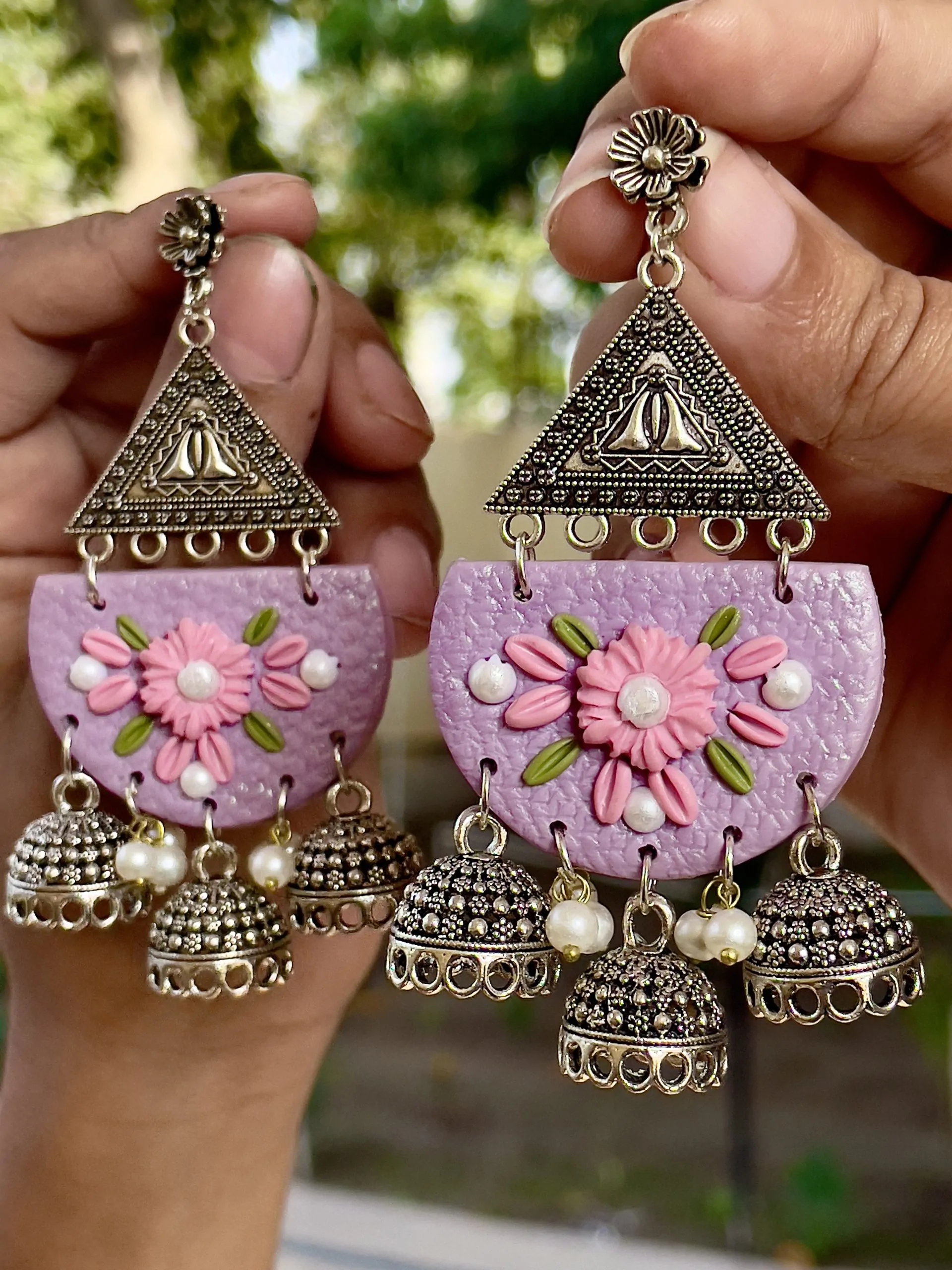 lilac half-moon chandelier earrings with sillver filigree and five Jhumka bell drops